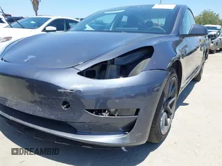 2023 Tesla Model 3 with VIN 5YJ3E1EA1PF545402, listed as a IAAI auction lot 42671354 with 37,948 mi miles and . Bid and sale history available at DreamBid. Image 6.