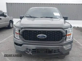 2021 Ford F-150 XL z VIN 1FTEW1CP1MKD41646, wystawiony jako IAAI lot #42174841 z przebiegiem 52 968 mil mil oraz . Historia ofert i sprzedaży dostępna na DreamBid. Obrazek 12.