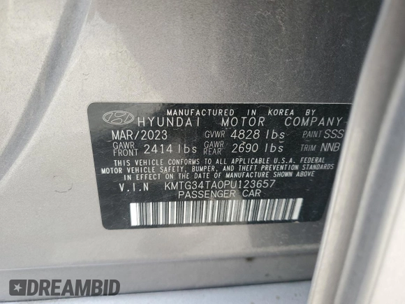 2023 Genesis G70 2.0T with VIN KMTG34TA0PU123657, listed as a Copart auction lot 72560954 with 26,678 mi miles and Salvage Title. Bid and sale history available at carsss.com. Image 12.