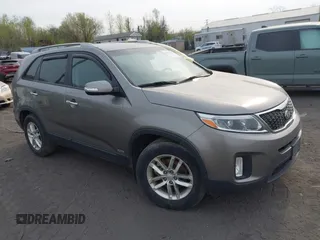 2015 Kia Sorento LX with VIN 5XYKTCA69FG584986, listed as a IAAI auction lot 41994391 with 118,760 mi miles. Bid and sale history available at carsss.com. Image 1.