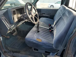 1990 GMC Sierra 1500 with VIN 1GTFC24K2LE554012, listed as a Copart auction lot 86004084 with 174,771 mi miles and Clean Title. Bid and sale history available at DreamBid. Image 7.