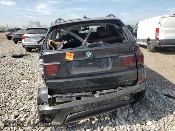 2012 BMW X5 35i with VIN 5UXZV4C54CL985119, listed as a Copart auction lot 56856735 with Not provided miles and Salvage title. Bid and sale history available at DreamBid. Image 6.