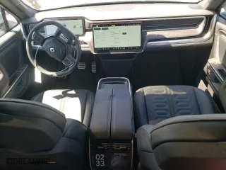 2024 Rivian R1S Adventure with VIN 7PDSGABA7RN036602, listed as a Copart auction lot 67867944 with 1,006 mi miles and Salvage Title. Bid and sale history available at carsss.com. Image 8.