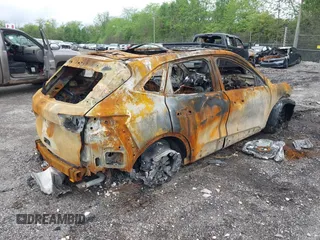 2020 Ford Escape Titanium z VIN 1FMCU9J92LUB90492, wystawiony jako IAAI lot #42243861 z przebiegiem 60 001 mil mil oraz . Historia ofert i sprzedaży dostępna na DreamBid. Obrazek 4.