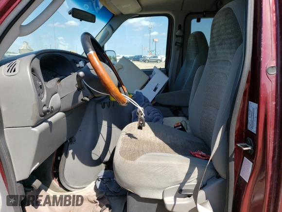 2004 Ford Econoline Passenger XL with VIN 1FBSS31LX4HB16895, listed as a Copart auction lot 65115554 with 48,980 mi miles and Salvage title. Bid and sale history available at DreamBid. Image 7.