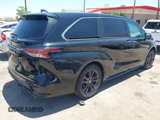 2021 Toyota Sienna XSE with VIN 5TDXRKEC6MS021909, listed as a IAAI auction lot 42432609 with 57,295 mi miles and . Bid and sale history available at DreamBid. Image 4.
