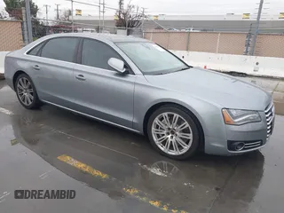 2012 Audi A8 L with VIN WAURVAFD5CN008320, listed as a IAAI auction lot 41508237 with 183,398 mi miles. Bid and sale history available at carsss.com. Image 1.