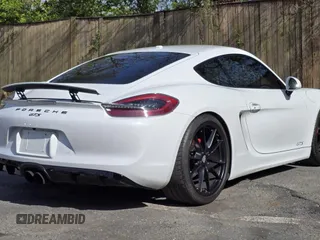 2016 Porsche Cayman S with VIN WP0AB2A88GK185895, listed as a Copart auction lot 54412305 with 27,100 mi miles and Salvage Title. Bid and sale history available at DreamBid. Image 4.