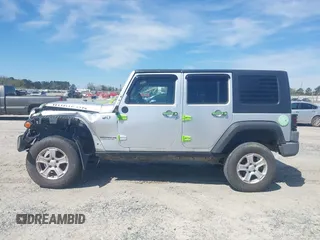 2008 Jeep Wrangler Unlimited Rubicon with VIN 1J4GA691X8L555097, listed as a IAAI auction lot 41889319 with 166,882 mi miles and . Bid and sale history available at DreamBid. Image 14.
