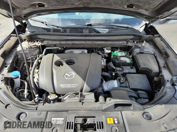 2019 Mazda CX-5 Grand Touring with VIN JM3KFADM2K1637664, listed as a Copart auction lot 63400975 with 45,663 mi miles and Salvage title. Bid and sale history available at DreamBid. Image 12.