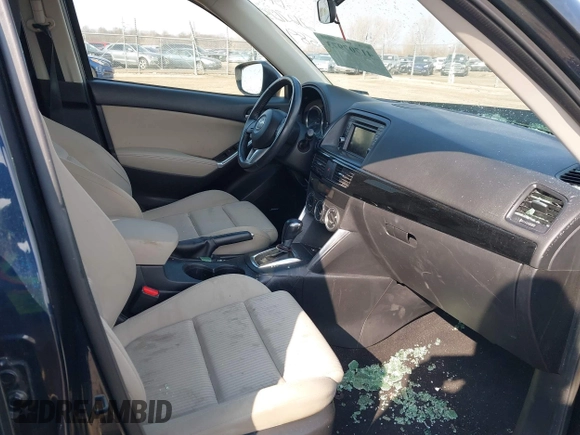 2015 Mazda CX-5 Touring with VIN JM3KE2CY0F0516589, listed as a IAAI auction lot 41707973 with 109,245 mi miles. Bid and sale history available at carsss.com. Image 5.
