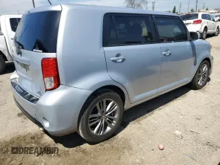 2013 Scion xB with VIN JTLZE4FE5DJ039321, listed as a Copart auction lot 52744485 with 128,536 mi miles and Salvage Title. Bid and sale history available at carsss.com. Image 3.