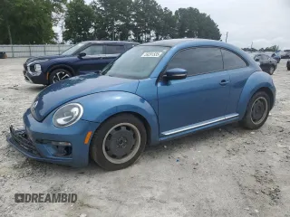 2018 Volkswagen Beetle S with VIN 3VWFD7ATXJM704802, listed as a Copart auction lot 59291535 with 117,074 mi miles and Salvage title. Bid and sale history available at DreamBid. Image 1.