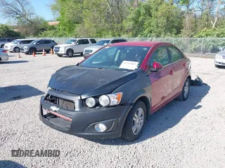 2013 Chevrolet Sonic LT with VIN 1G1JC5SH3D4256507, listed as a IAAI auction lot 42235009 with 117,804 mi miles and . Bid and sale history available at DreamBid. Image 2.