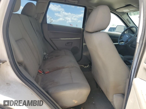 2005 Jeep Grand Cherokee Laredo with VIN 1J4GR48K05C625144, listed as a Copart auction lot 57477275 with 167,654 mi miles and Salvage title. Bid and sale history available at DreamBid. Image 11.
