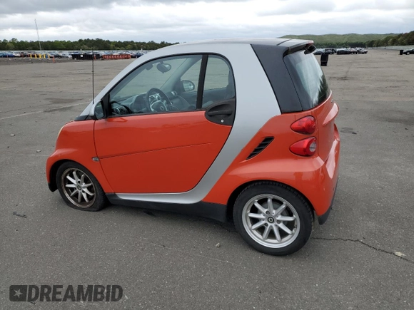 2008 Smart fortwo Pure z VIN WMEEJ31X18K155044, wystawiony jako Copart lot #58137355 z przebiegiem 62 718 mil mil oraz Szkody całkowita. Historia ofert i sprzedaży dostępna na DreamBid. Obrazek 2.