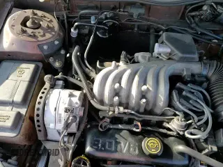 1989 Ford Taurus GL z VIN 1FABP52U1KA299938, wystawiony jako Copart lot #86684144 z przebiegiem 52 675 mil mil oraz Szkoda całkowita • Salvage title. Historia ofert i sprzedaży dostępna na DreamBid. Obrazek 14.