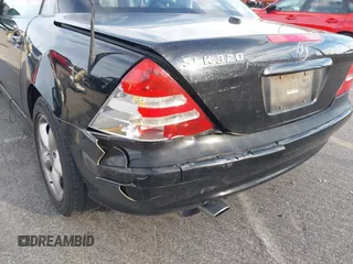2003 Mercedes-Benz SLK-Class 3.2L with VIN WDBKK65F43F281612, listed as a IAAI auction lot 41674178 with 153,517 mi miles. Bid and sale history available at carsss.com. Image 6.