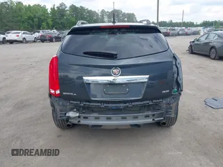 2014 Cadillac SRX Luxury Collection z VIN 3GYFNEE38ES626949, wystawiony jako IAAI lot #42194679 z przebiegiem 173 303 mil mil oraz . Historia ofert i sprzedaży dostępna na DreamBid. Obrazek 16.