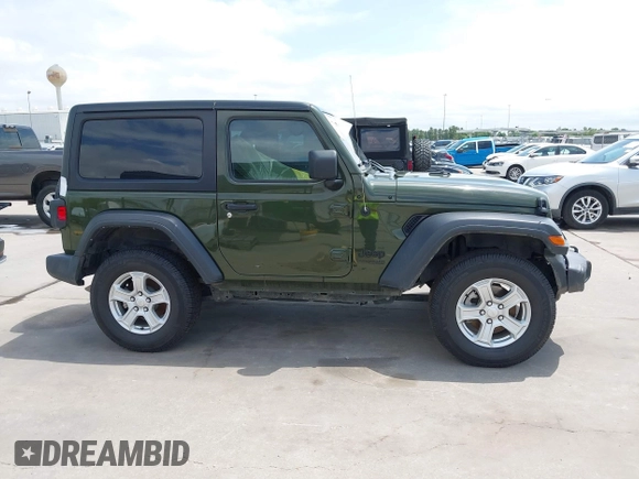 2021 Jeep Wrangler Sport with VIN 1C4GJXAN5MW852653, listed as a IAAI auction lot 42073214 with 53,834 mi miles and . Bid and sale history available at DreamBid. Image 14.