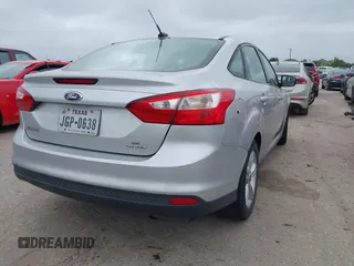 2014 Ford Focus SE with VIN 1FADP3F21EL354774, listed as a IAAI auction lot 41972701 with 115,046 mi miles. Bid and sale history available at carsss.com. Image 4.