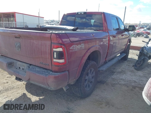 2021 Ram 2500 Laramie with VIN 3C6UR5NL1MG650746, listed as a IAAI auction lot 41676556 with Not Provided miles. Bid and sale history available at carsss.com. Image 4.