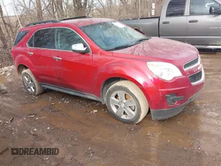 2015 Chevrolet Equinox LT z VIN 2GNALBEK7F6433999, wystawiony jako IAAI lot #41650736 z przebiegiem 191 236 mil mil oraz . Historia ofert i sprzedaży dostępna na DreamBid. Obrazek 1.