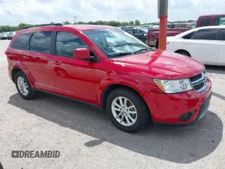 2015 Dodge Journey SXT with VIN 3C4PDCBB2FT560777, listed as a IAAI auction lot 42017660 with 132,628 mi miles. Bid and sale history available at carsss.com. Image 1.