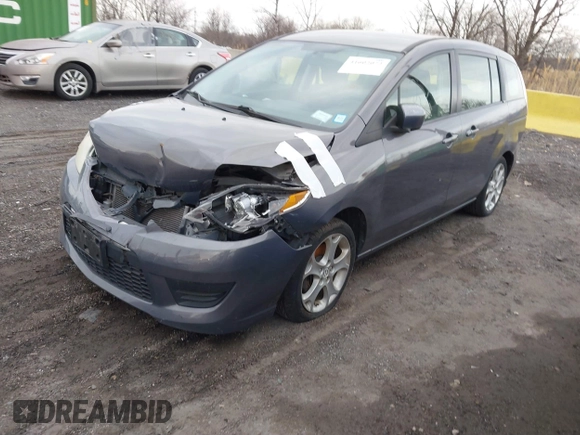2010 Mazda 5 Sport with VIN JM1CR2WLXA0370650, listed as a IAAI auction lot 41602072 with 142,611 mi miles and . Bid and sale history available at DreamBid. Image 2.
