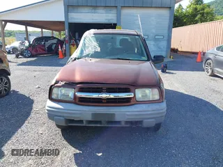 2000 Chevrolet Tracker z VIN 2CNBJ13C3Y6917675, wystawiony jako IAAI lot #42281654 z przebiegiem 153 805 mil mil oraz . Historia ofert i sprzedaży dostępna na DreamBid. Obrazek 13.