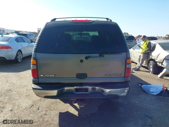 2002 Chevrolet Tahoe LT with VIN 1GNEC13Z12J233208, listed as a IAAI auction lot 41659873 with 238,922 mi miles. Bid and sale history available at carsss.com. Image 16.