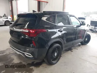 2021 Kia Seltos EX with VIN KNDERCAA8M7216342, listed as a IAAI auction lot 41566334 with 74,109 mi miles. Bid and sale history available at carsss.com. Image 4.