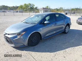 2022 Toyota Corolla LE with VIN JTDEPMAE1NJ200552, listed as a IAAI auction lot 40465421 with 62,929 mi miles. Bid and sale history available at carsss.com. Image 2.