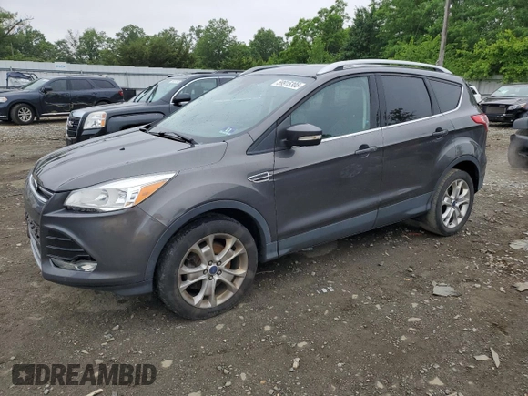 2016 Ford Escape Titanium with VIN 1FMCU9J95GUA58624, listed as a Copart auction lot 59915305 with 102,061 mi miles and Salvage title. Bid and sale history available at DreamBid. Image 1.