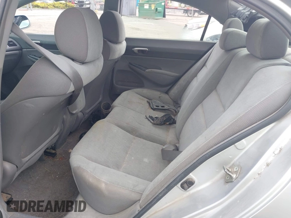 2010 Honda Civic LX with VIN 2HGFA1F59AH323381, listed as a IAAI auction lot 42181040 with 320,419 mi miles and . Bid and sale history available at DreamBid. Image 8.