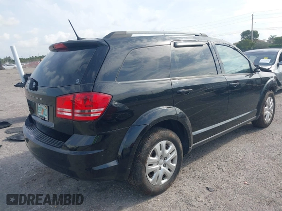 2017 Dodge Journey SE with VIN 3C4PDCAB4HT691343, listed as a IAAI auction lot 41863725 with 99,519 mi miles and . Bid and sale history available at carsss.com. Image 4.