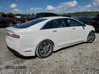 2013 Lincoln MKZ z VIN 3LN6L2G98DR804632, wystawiony jako Copart lot #56985055 z przebiegiem 128 509 mil mil oraz Szkoda całkowita • Salvage title. Historia ofert i sprzedaży dostępna na DreamBid. Obrazek 3.