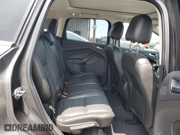 2015 Ford Escape Titanium with VIN 1FMCU9J98FUB49112, listed as a Copart auction lot 58989915 with 94,060 mi miles and Salvage title. Bid and sale history available at DreamBid. Image 10.