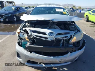 2011 Toyota Corolla L with VIN JTDBU4EE0B9151332, listed as a IAAI auction lot 41970433 with 113,157 mi miles. Bid and sale history available at carsss.com. Image 6.