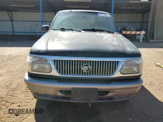 1997 Mercury Mountaineer z VIN 4M2DU52P5VUJ58731, wystawiony jako Copart lot #69710404 z przebiegiem 266 522 mil mil oraz Tytuł czysty. Historia ofert i sprzedaży dostępna na DreamBid. Obrazek 5.