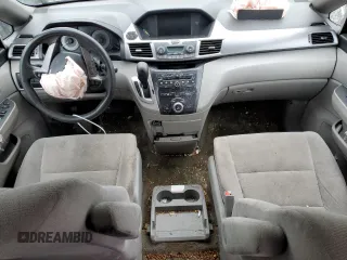 2013 Honda Odyssey LX z VIN 5FNRL5H28DB085114, wystawiony jako Copart lot #52942495 z przebiegiem 158 191 mil mil oraz Szkoda całkowita • Salvage title. Historia ofert i sprzedaży dostępna na DreamBid. Obrazek 8.