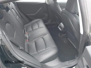 2018 Tesla Model 3 Long Range Battery with VIN 5YJ3E1EB1JF127289, listed as a IAAI auction lot 41484253 with 60,577 mi miles and . Bid and sale history available at DreamBid. Image 8.