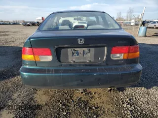 1998 Honda Civic DX with VIN 1HGEJ6221WL116188, listed as a Copart auction lot 47105105 with 50,017 mi miles and Salvage Title. Bid and sale history available at DreamBid. Image 6.
