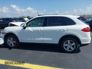 2014 Porsche Cayenne with VIN WP1AA2A20ELA02638, listed as a IAAI auction lot 42349570 with 113,355 mi miles and . Bid and sale history available at DreamBid. Image 14.