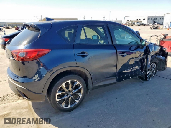 2016 Mazda CX-5 Grand Touring with VIN JM3KE2DY6G0668313, listed as a Copart auction lot 48353535 with 70,085 mi miles and Salvage Title. Bid and sale history available at carsss.com. Image 3.