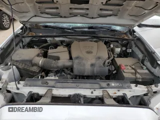 2018 Toyota Tacoma SR5 z VIN 5TFAZ5CNXJX065932, wystawiony jako Copart lot #52046845 z przebiegiem 61 980 mil mil oraz Szkoda całkowita • Salvage title. Historia ofert i sprzedaży dostępna na DreamBid. Obrazek 11.