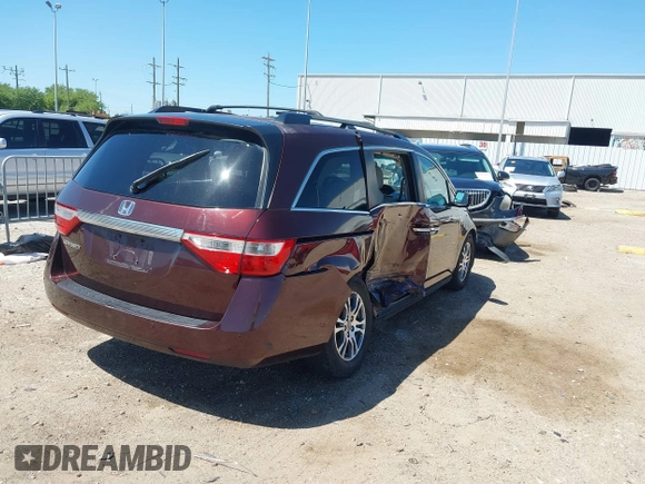 2011 Honda Odyssey EX with VIN 5FNRL5H42BB021438, listed as a IAAI auction lot 41978690 with 190,495 mi miles and . Bid and sale history available at carsss.com. Image 4.