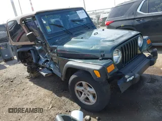 2002 Jeep Wrangler Sport with VIN 1J4FA49S62P743771, listed as a IAAI auction lot 41791205 with 186,622 mi miles. Bid and sale history available at carsss.com. Image 1.