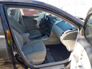 2013 Toyota Corolla L with VIN 5YFBU4EEXDP086518, listed as a IAAI auction lot 41654757 with 151,913 mi miles. Bid and sale history available at carsss.com. Image 5.
