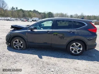2019 Honda CR-V EX with VIN 5J6RW1H52KA035139, listed as a IAAI auction lot 41914694 with 64,789 mi miles. Bid and sale history available at carsss.com. Image 15.